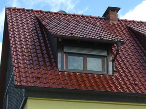 Umgestaltung der Dachgauben von Flachdach in Ziegeleindeckung